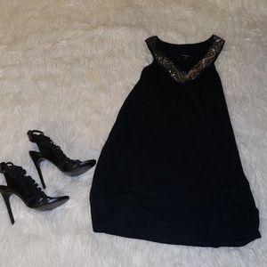 Black dress with detailed neckline